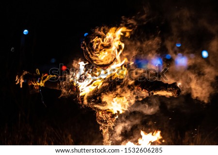 Traditional burning of effigy on bonfire