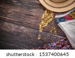 Traditional Camisole of the handmade peasant woman of Panama, with her gold jewelry and panama hat