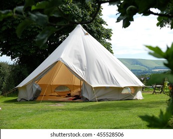 Traditional canvas bell tent in english countryside