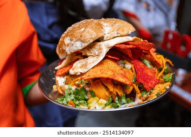 Traditional Cemita Puebla with Doritos. Traditional Mexican dish