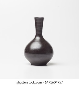 A traditional ceramic jar on a white background - Shutterstock ID 1471604957