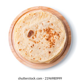 Traditional chapati tortillas on a blackboard are isolated on a white background in close-up. Indian cuisine. Top view - Shutterstock ID 2196980999