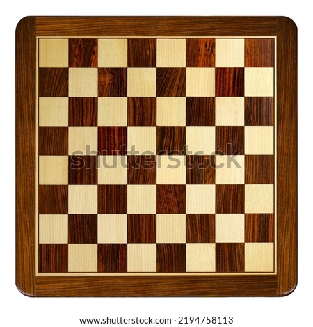 A traditional checkers or chess board in closeup top view