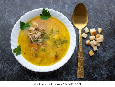 Traditional Chicken Noodle Soup, Overhead Scene On A Rustic Wooden Background