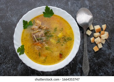 Traditional Chicken Noodle Soup, Overhead Scene On A Rustic Wooden Background