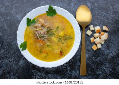 Traditional Chicken Noodle Soup, Overhead Scene On A Rustic Wooden Background