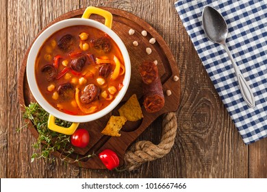 Traditional Chickpea Soup With Paprika And Chorizo Sausage. Top View.