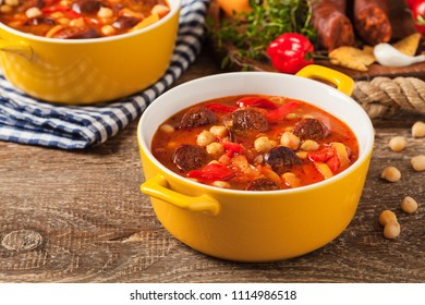 Traditional Chickpea Soup With Paprika And Chorizo Sausage. Front View.