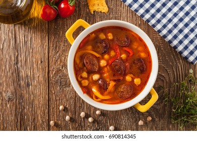 Traditional Chickpea Soup With Paprika And Chorizo Sausage. Top View.