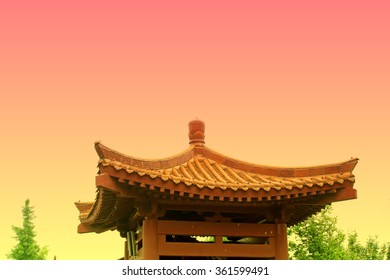 Traditional Chinese Architectural Style Yellow Glazed Tile Roof, Closeup Of Photo
