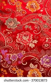 Traditional Chinese Floral Print Pattern On Red Fabric