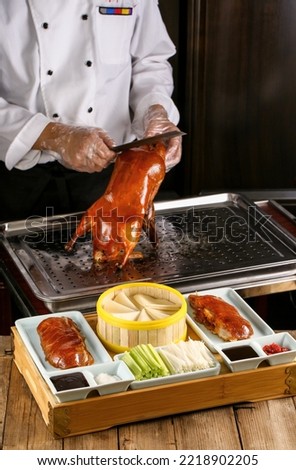 Traditional Chinese Food: Chef prepares Peking roasted Duck,Beijing roasted Duck