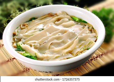 Traditional Chinese food: knife noodles - Shutterstock ID 1726357375
