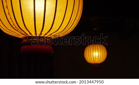 Traditional Chinese laterns shining in the dark.