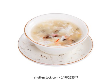Traditional Chinese Mixed Seafood Soup in bowl plate isolated on white background.