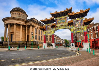 Traditional chinese style entrance gate to the China Town in Liverpool city, England, UK. The chinese text on the arch says 中国成 - 