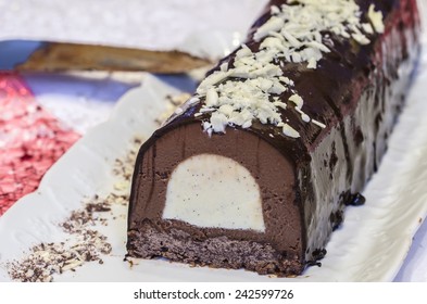 A traditional chocolate Christmas cake on the table 