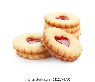 Traditional Christmas Linzer cookies with sweet jam on white background