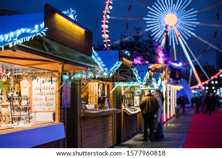 Traditional Christmas market in Europe, Brussels, Belgium. Main town square with decorated tree and lights. Christmas fair concept
