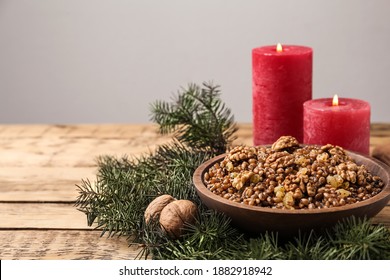 Traditional Christmas slavic dish kutia served on wooden table. Space for text
