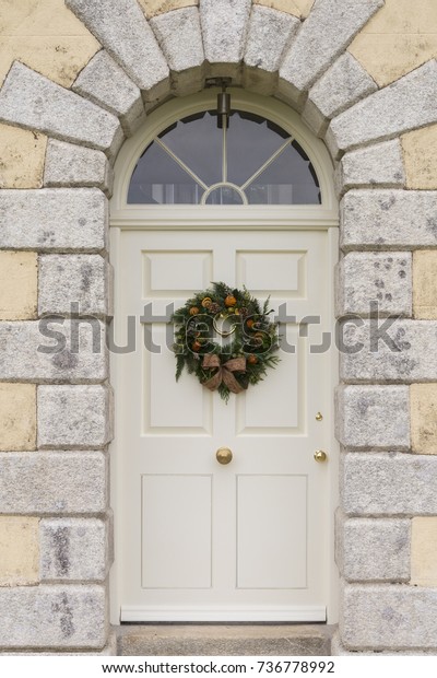 Traditional Christmas Wreath On English Country Stock Photo