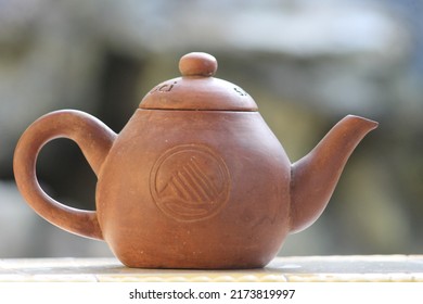 traditional clay teapot for brown tea water