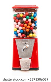 Traditional coin-operated gumball machine filled with multi coloured balls of chewing gum gobstoppers jawbreakers