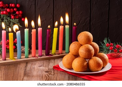 Traditional Colombian Buñuelo - Christmas Atmosphere. Candles