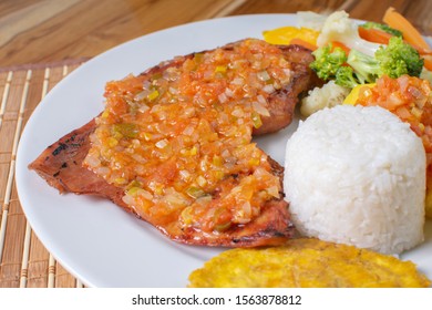 Traditional Colombian Food  
With Fried Banana, Rice, Arepa And Vegetables