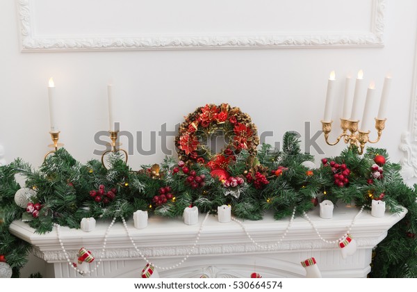 Traditional Colorful Christmas Wreath Hanging Above Stock Image