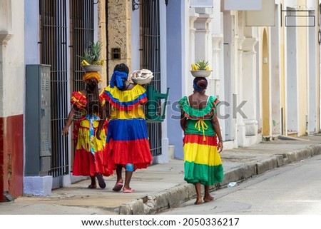 Similar – Image, Stock Photo Colombian woman selling traditional Guarapo in bottles
