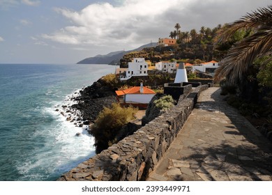 Traditional and colorful houses located along a coastal path in San Andres, La Palma, Canary Islands, Spain. This coastal path leads to Charco Azul natural pools