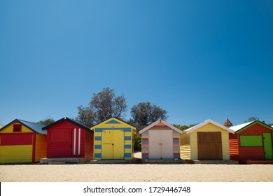 Traditional And Colourful Little Beach House In A Row At Brighton Beach In Victoria, Australia


