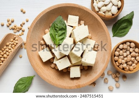 Similar – Image, Stock Photo Vegetarian vegetable and tofu sandwich with yogurt sauce. black background
