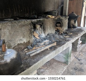 Traditional cooking using charcoal and wood. Dirty kitchen  - Shutterstock ID 1550214761