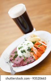 Traditional Corned Beef Dinner With Beer On A Table