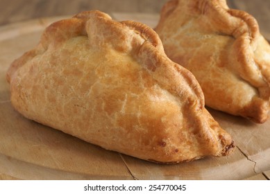 Traditional Cornish pasties filled with meat potato swede and carrots - Shutterstock ID 254770045