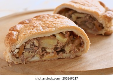 Traditional Cornish pasty filled with meat potato swede and carrots - Shutterstock ID 205269217