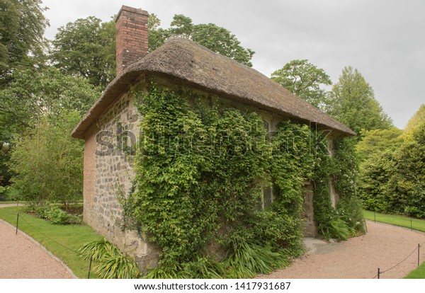 Traditional Cornish Thatched Roof Cottage Village Stock Photo