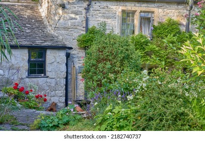 Traditional Cotswolds Cottage Garden In Summer