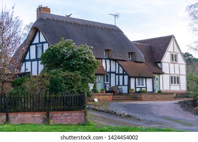 Traditional cottage houses with the straw roof Aspley Guise, Milton Keynes - Shutterstock ID 1424454002
