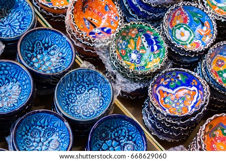 Traditional Cretan painted ceramic dishes for sale at a city centre shop along Odos 1821, Heraklion, Crete, Greece, Europe.