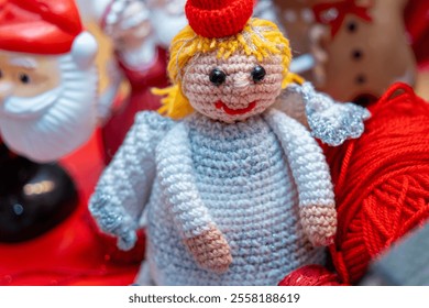 traditional crocheted angel figurine in white dress for Christmas decoration - Powered by Shutterstock