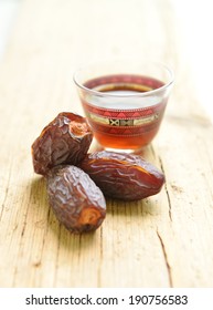 A Traditional Cup Of Arabic Tea And Dates