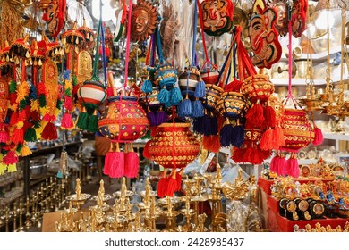 traditional dahi handi or Matka earthen pot)tied up high on the Gokulashtami festival which is Lord Shri Krishna's birthday. Indian youth form a human pyramid to break the Dahi Handi