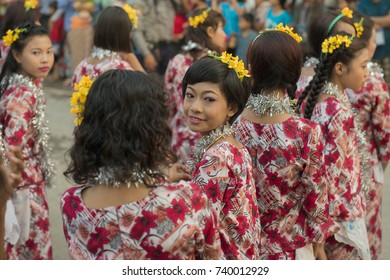 Traditional Dance Girls at the Thingyan Water Festival at the Myanmar New Year in the city centre of Mandalay in Manamar in Southeastasia, yanmar,  mandalay, april, 2015..