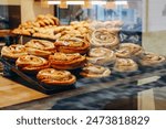 Traditional Danish pastries in a bakery window in Copenhagen