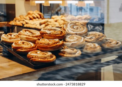 Traditional Danish pastries in a bakery window in Copenhagen - Powered by Shutterstock