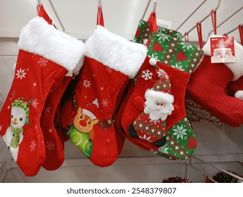 The traditional decorations include stars, bells, reindeer, candles, candy canes, garland, stockings, wreaths, snow globes, and angels. - Powered by Shutterstock