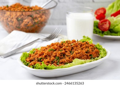 Traditional delicious Turkish foods: bulgur salad (kisir) - Powered by Shutterstock